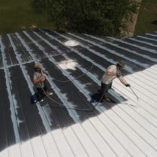 picture of two painters painting commercial building in detroit-2